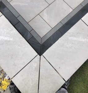 Porcelain borders mitred on every angle